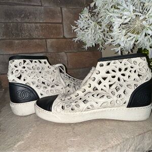 CHANEL High-top Laser Cut Camellia Flower Sneakers